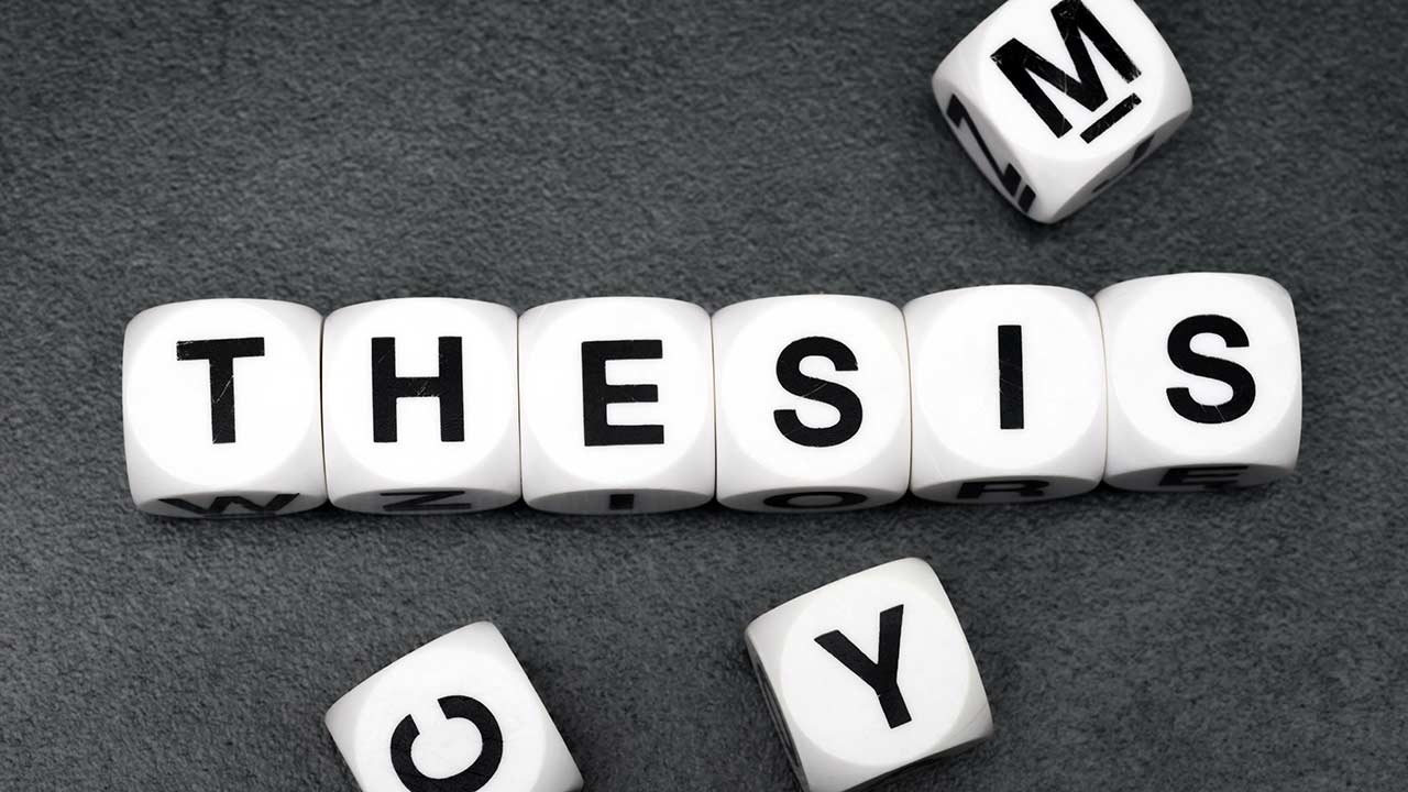 The word Thesis is composed with Scrabble letters