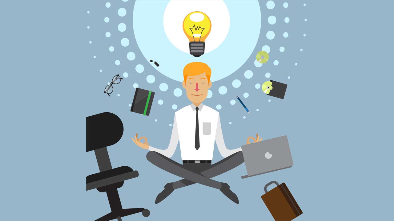 Man meditating, lamp above him, office stuff flying past him right and left